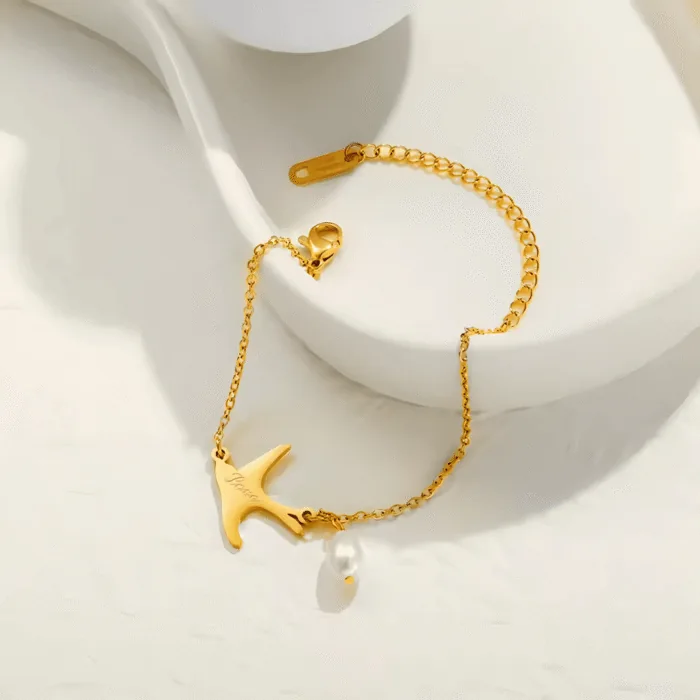 Bracelet doré à hirondelle et perle goutte, bijou à petit prix