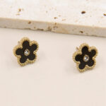 Boucles d’oreilles clous fleur noire dorées chic femme