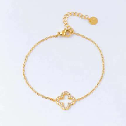 Bracelet chaîne fine dorée femme à trèfle ajouré serti de strass, avec fermoir et rallonge