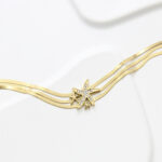 Bracelet doré femme multi-rangs motif étoile de mer