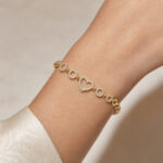 Bracelet doré cœur ajouré cercles brillants chic femme