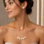 Parure dorée collier double rang et boucles rondes femme