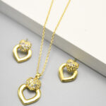 Parure dorée femme pendentif double cœur doré chic – Image 2