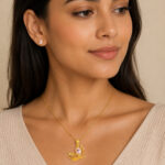 Parure dorée femme pendentif escargot rose lumineux