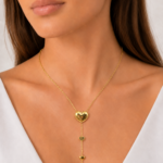 Parure dorée femme collier cœur et boucles ajourées