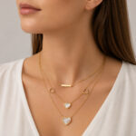 Parure dorée collier multirang cœurs et puces femme