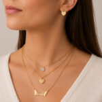 Parure dorée collier multirang Smile et cœurs femme