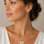 Parure bicolore collier papillon et puces fleur femme