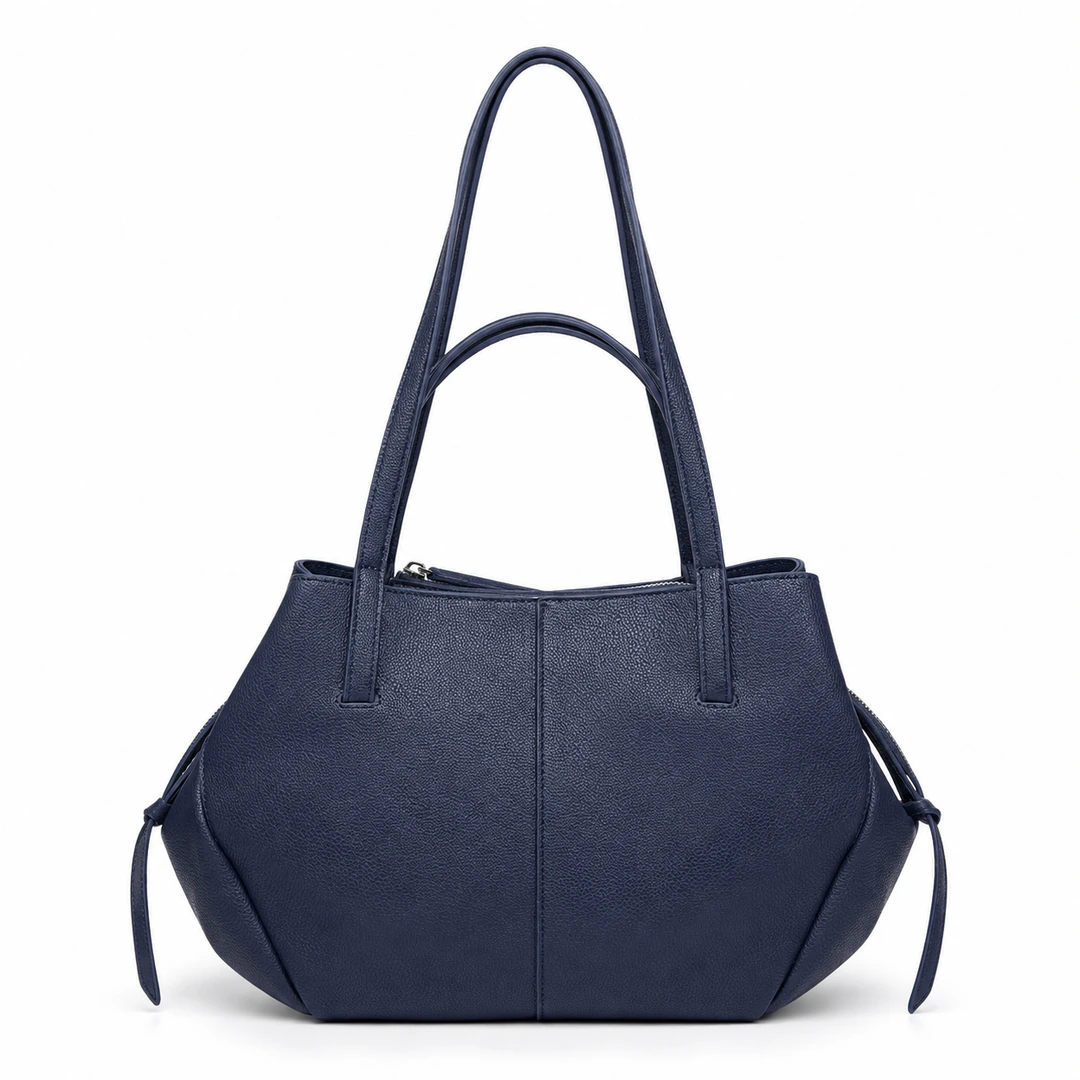 Sac cabas bleu marine zippé vu de face, liens latéraux noués et couture centrale